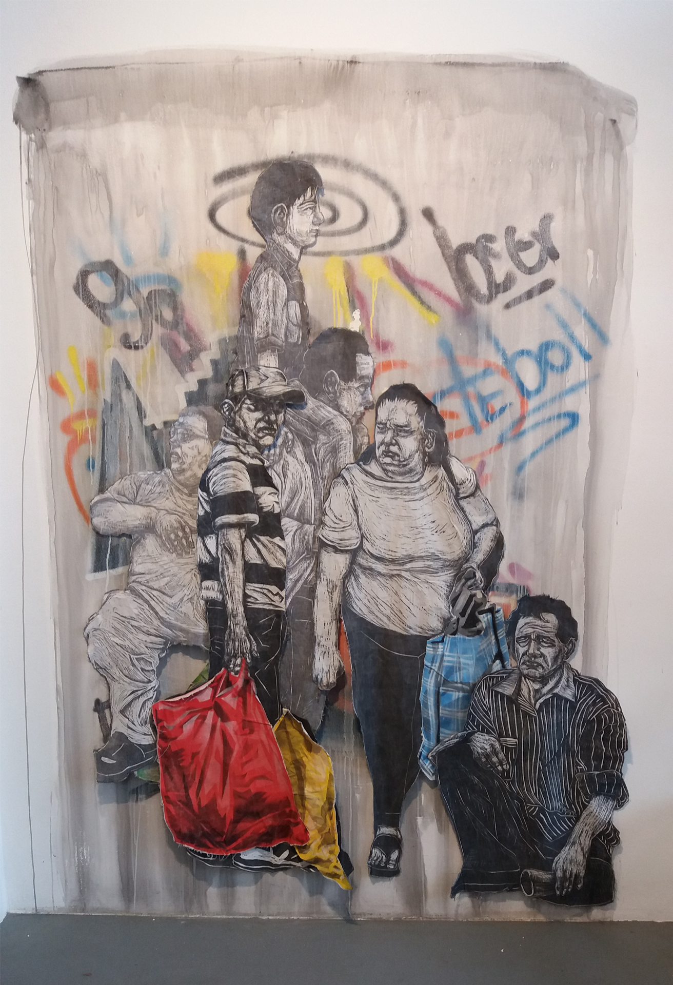 A group of large scale relief printed figures are arranged with varying opacity of ink to imply atmospheric perspective. The figures, referencing the working class are situated among graffiti