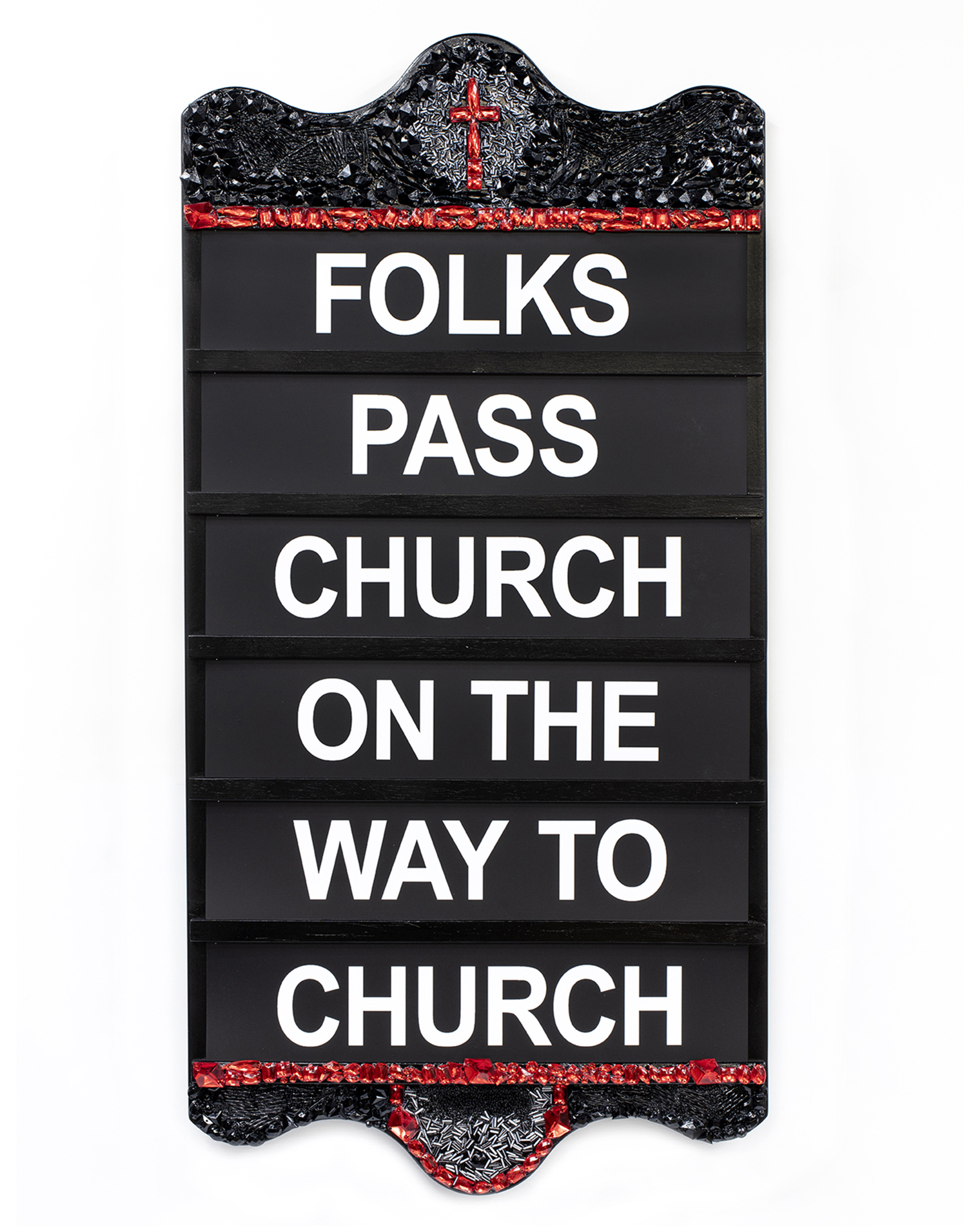 What Aunt Tump Told Me Mixed media and hymnal board 33" x18" Photo credit: CJ Benninger The slats of a hymnal board are filled with the text "Folks pass church on the way to church"