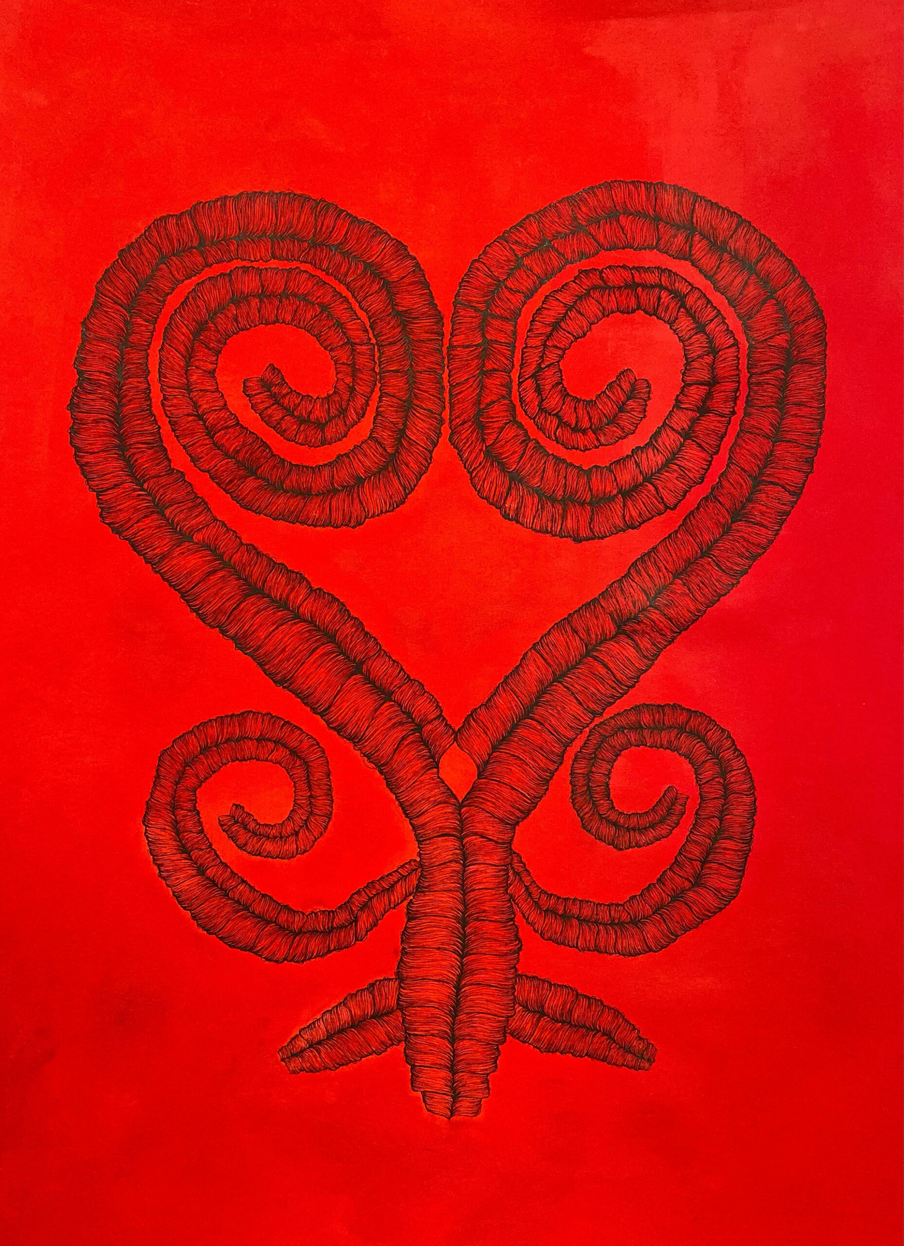 Image of Sankofa symbol on red background