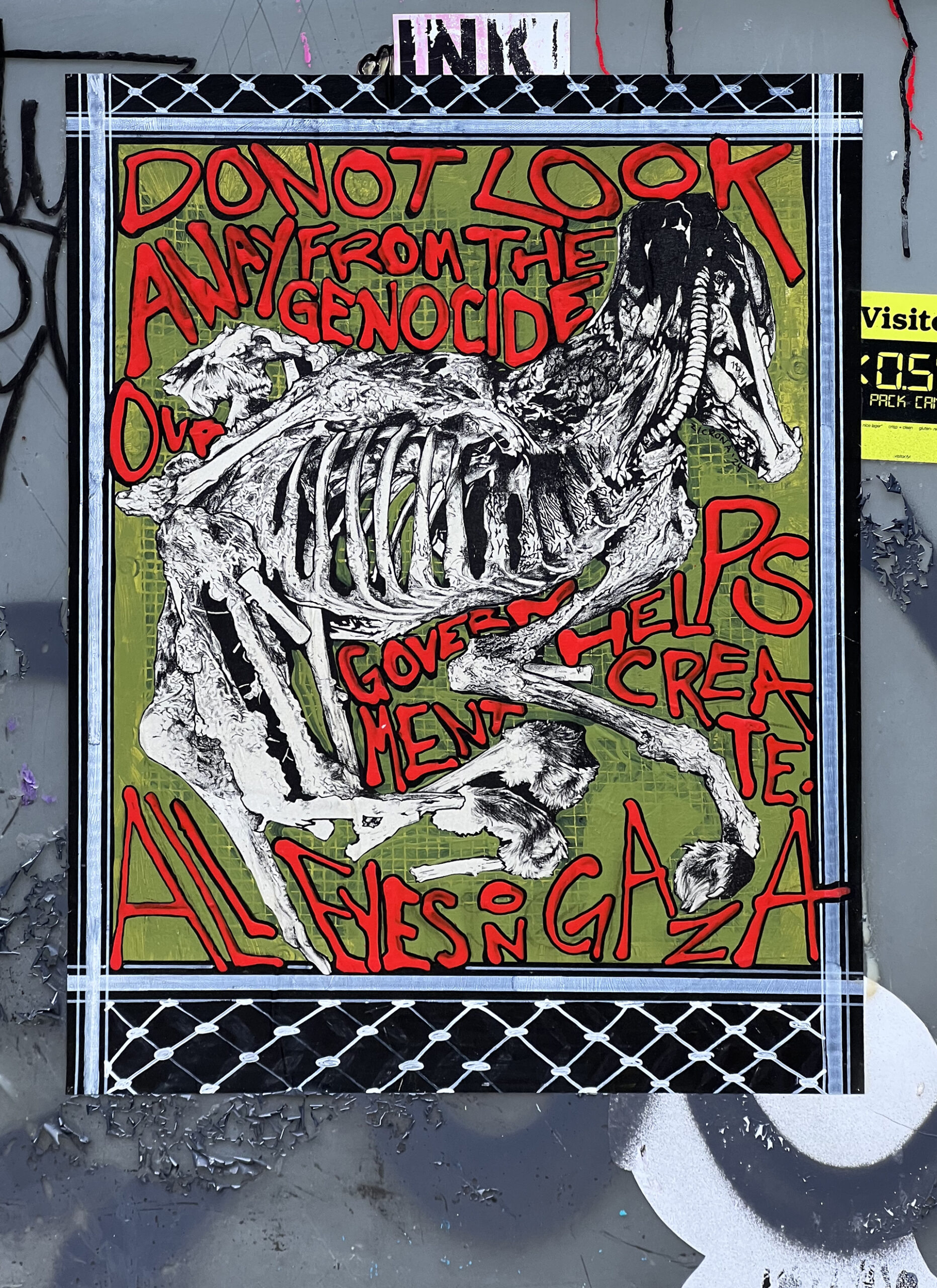 A paste up on a graffitied wall of a dog skeleton surrounded by the stylized text "Do not look away from the genocide helps create. All eyes on Gaza"