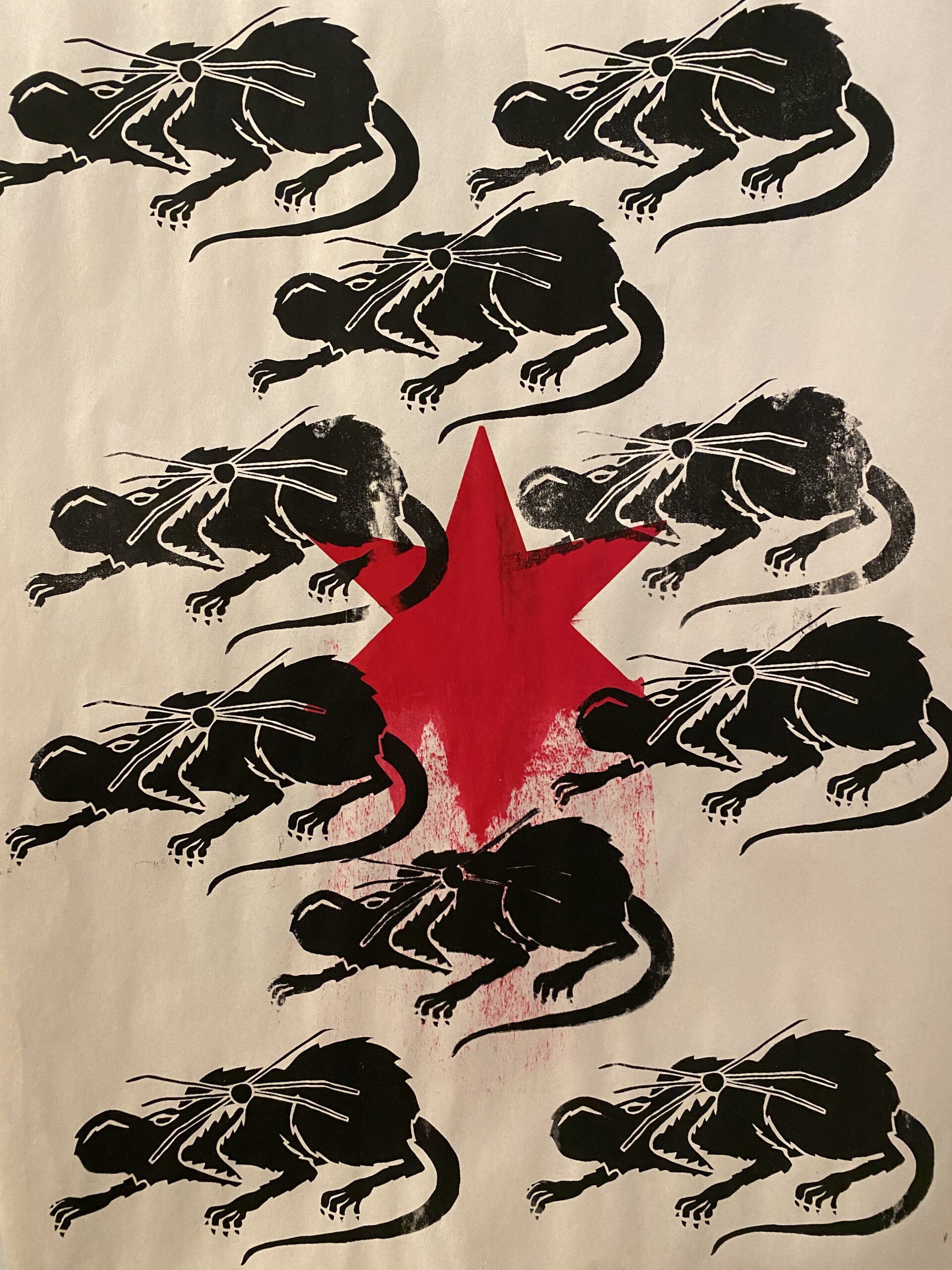 Ten cornered rats printed in black make up the background of this print where a red star dissolves in the center