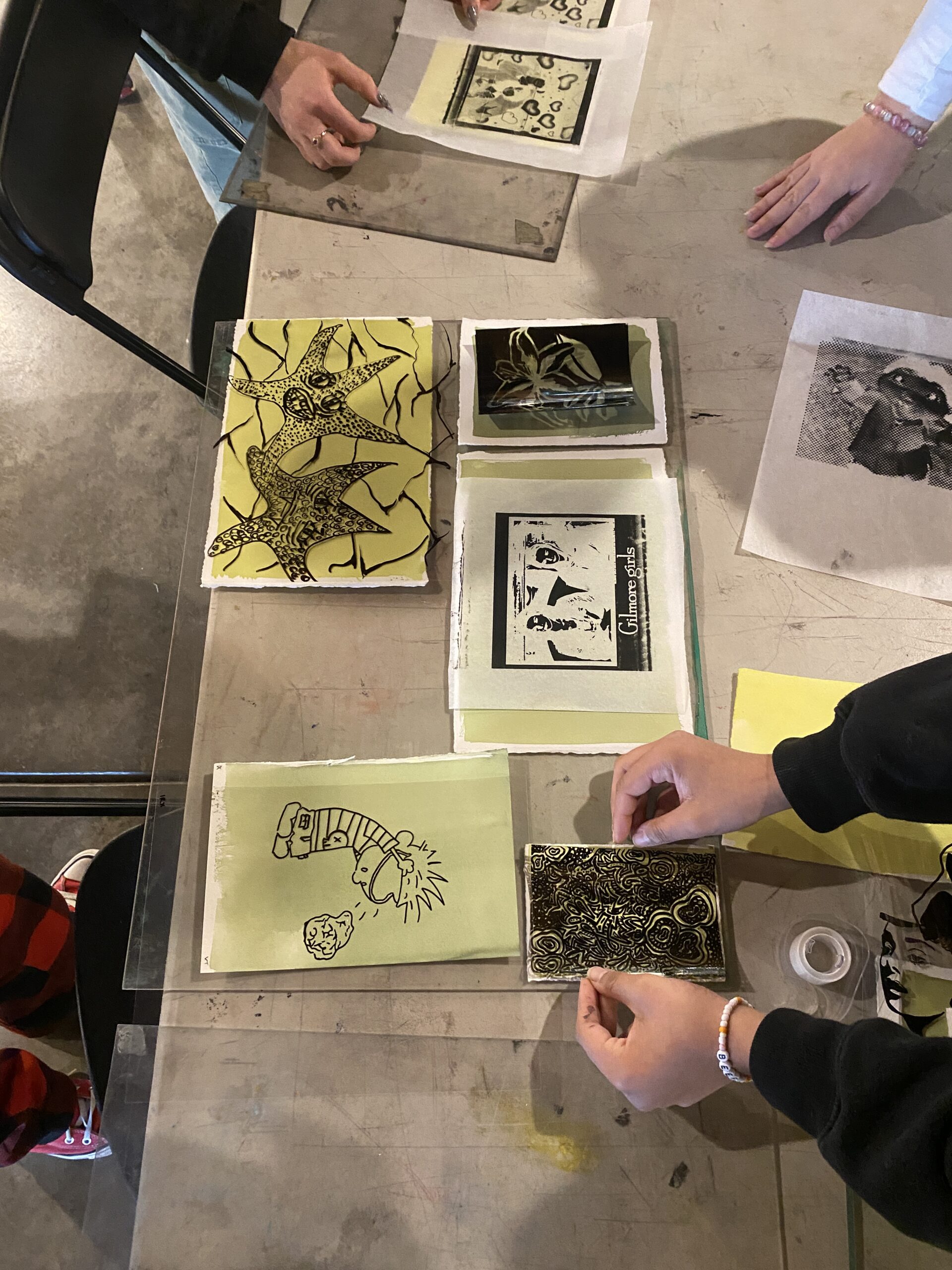 Student hands working on cyanotypes at Marwen school for young artists