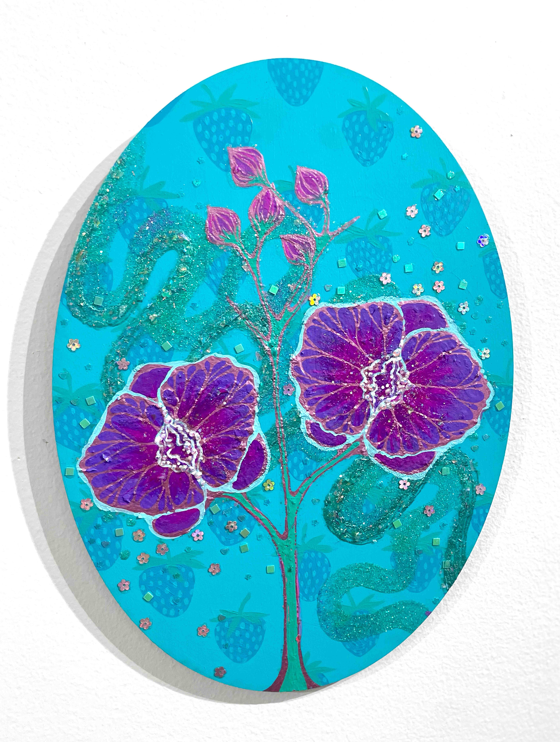 A pair of purple flowers on a teal ground of strawberries is accented in glitter and rhinestones to resemble embroidery