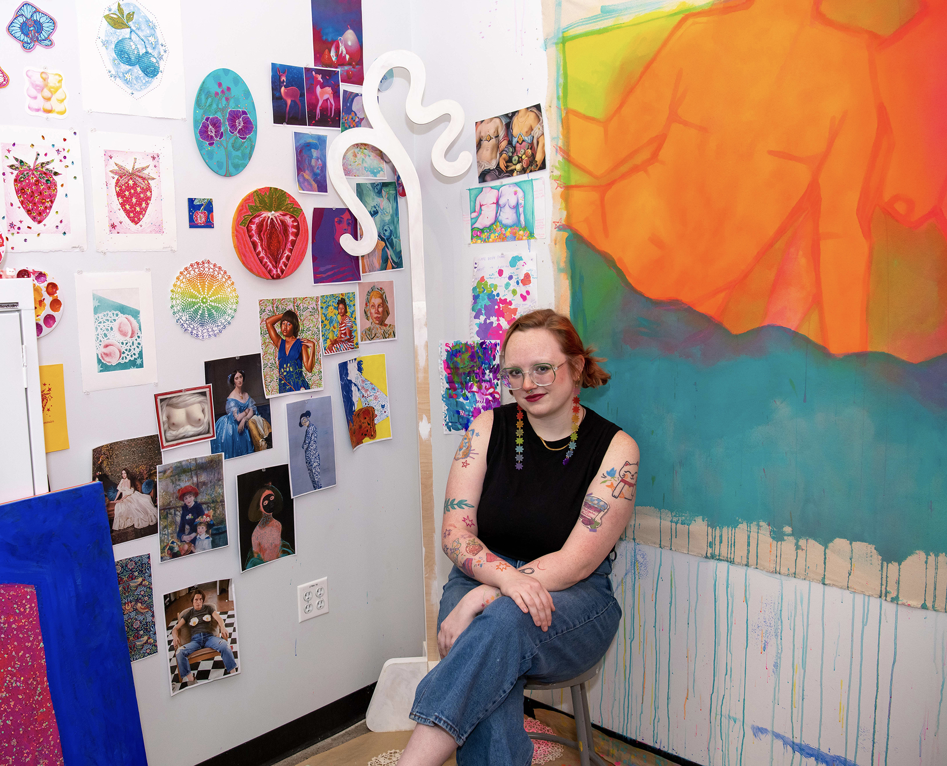 Photo of the artist in their studio