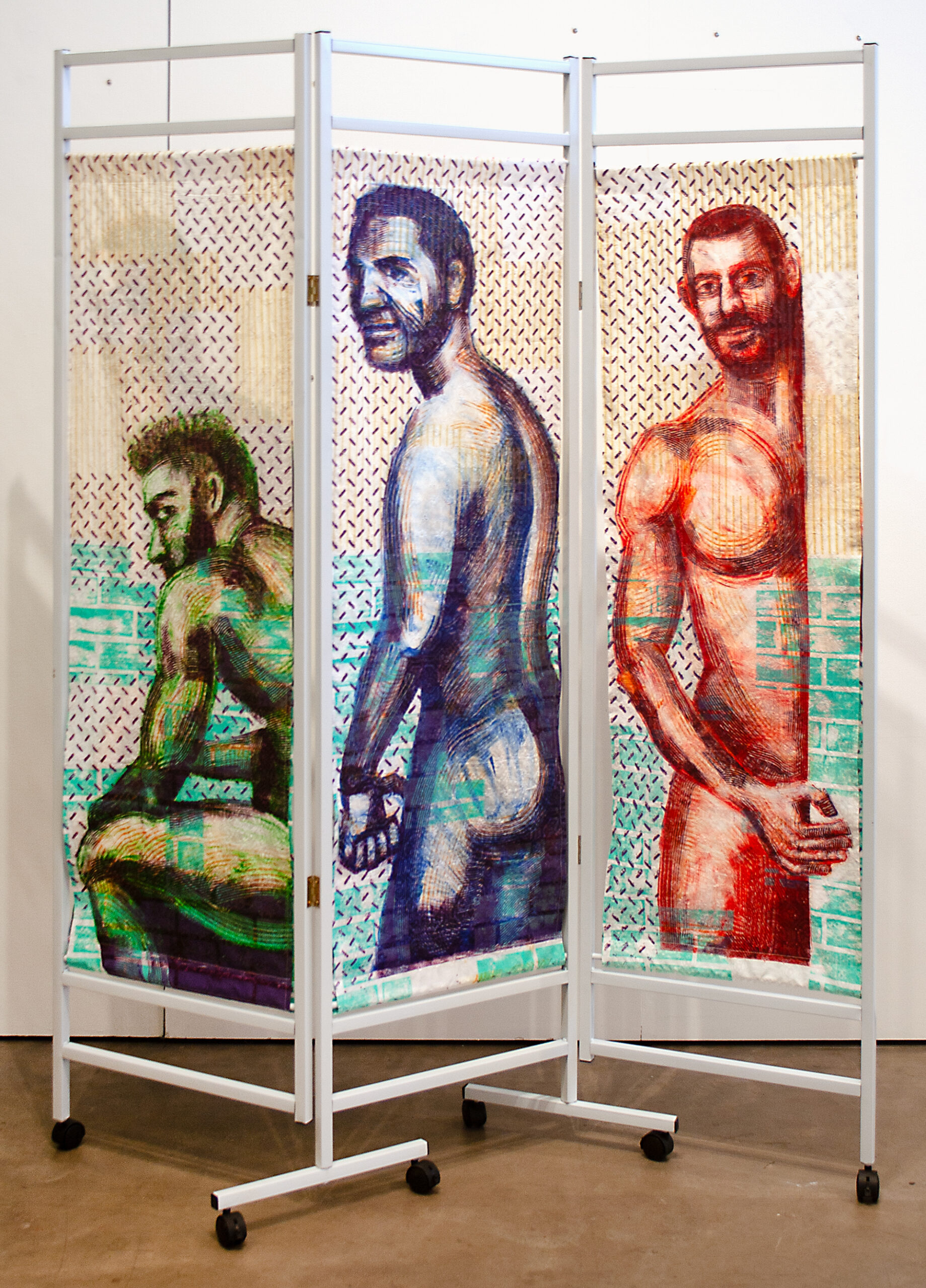 Three nude men are monoprinted in green, blue, and red, on the textured fabric of a folding screen, evoking vintage changing screens or those found in exam rooms.