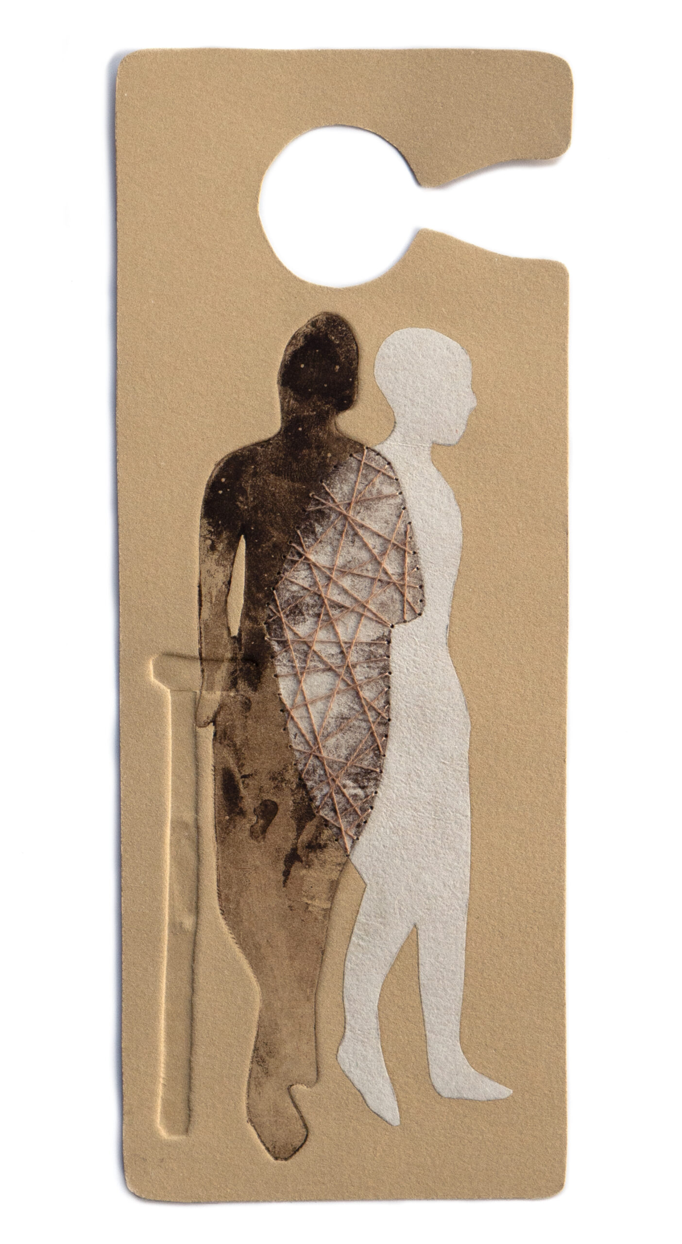 A print shaped like an accessible-parking placard featuring overlapping brown and white standing figures holding an embossed cane and embroidered with tan thread.