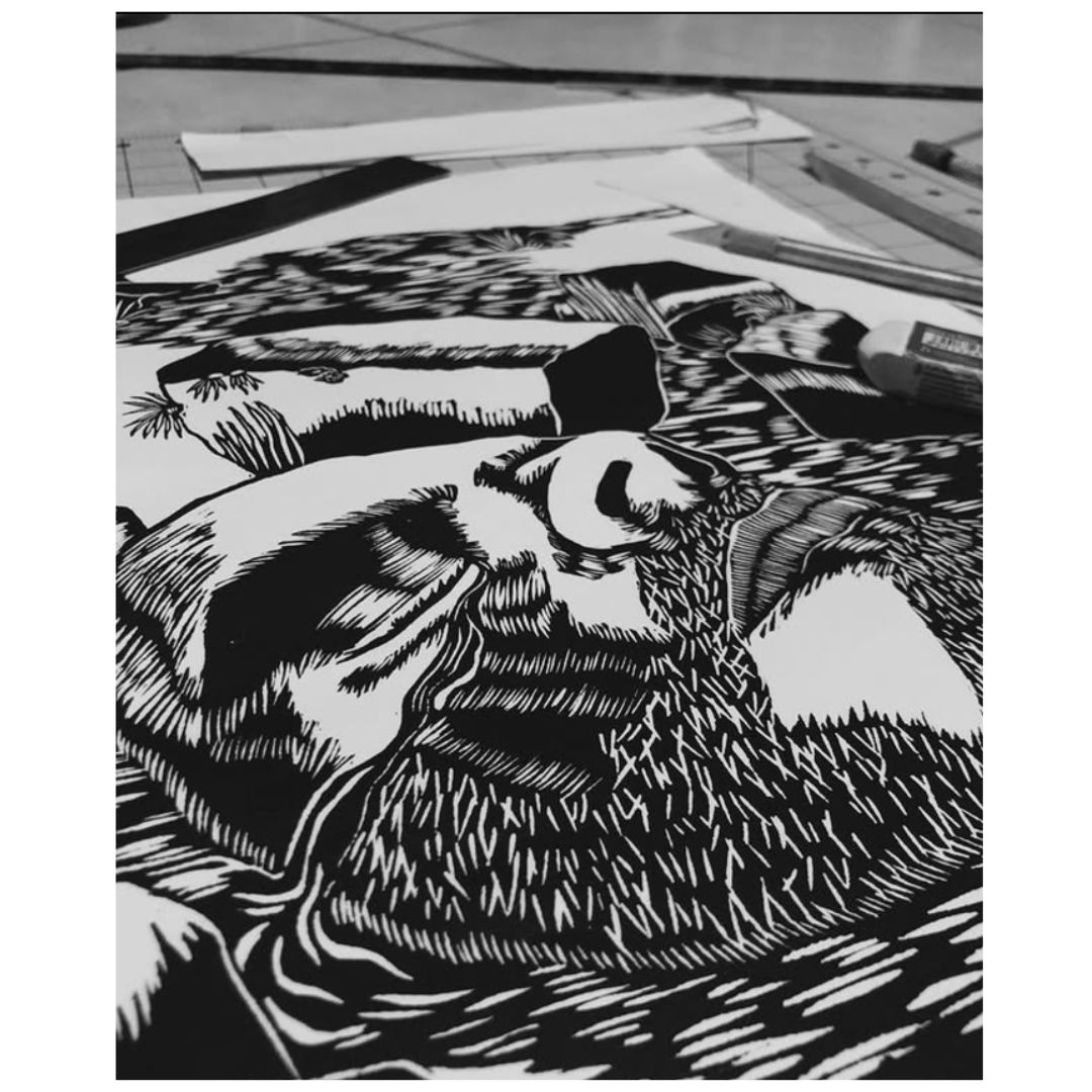 A bearded figure is composed of detailed linocut marks