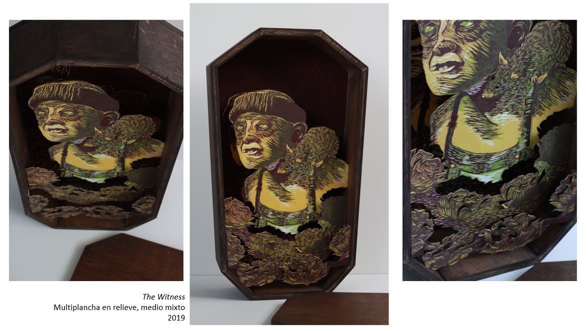 A dimensional print of a man with a rat on his shoulder among flowers or cabbage sits in a shadowbox frame shaped like a casket.