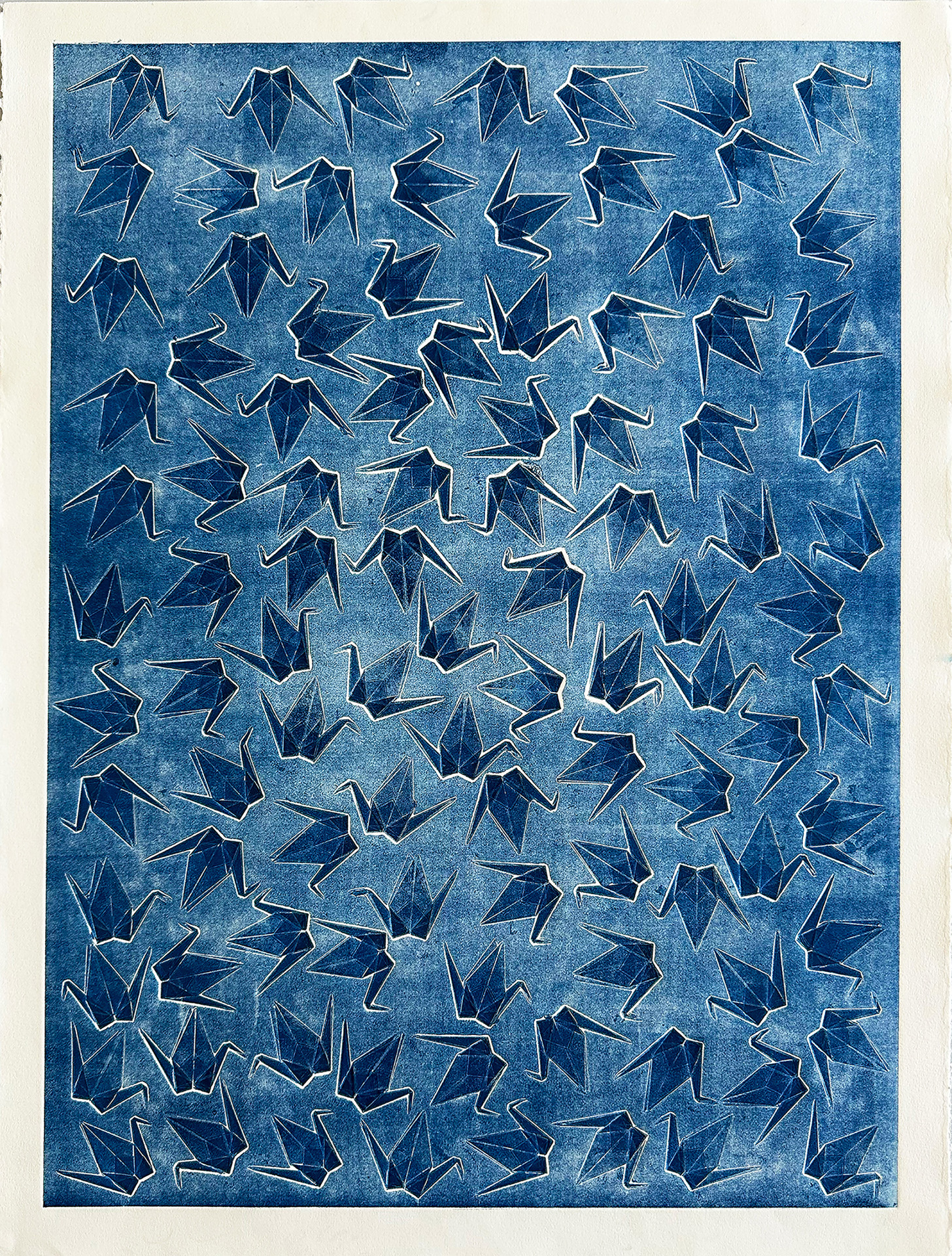 PrussianMakePeaceNotWar_SokSong_10 Folded paper cranes—a traditional symbol of peace—are printed in deep Prussian blue using collograph transfer techniques. Their ghostly repetition across the paper becomes a call for pacifism amidst a history marked by militarization. The title, a gentle provocation, reclaims the color of militaristic uniforms to propose an alternative future shaped by tenderness, not force.