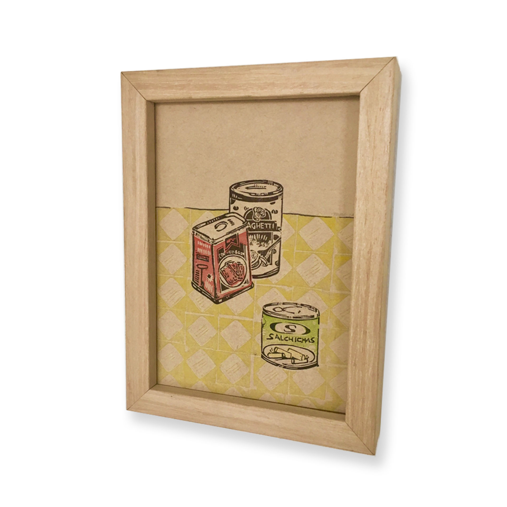 An arrangement of canned meat and spaghetti on a patterned tablecloth
