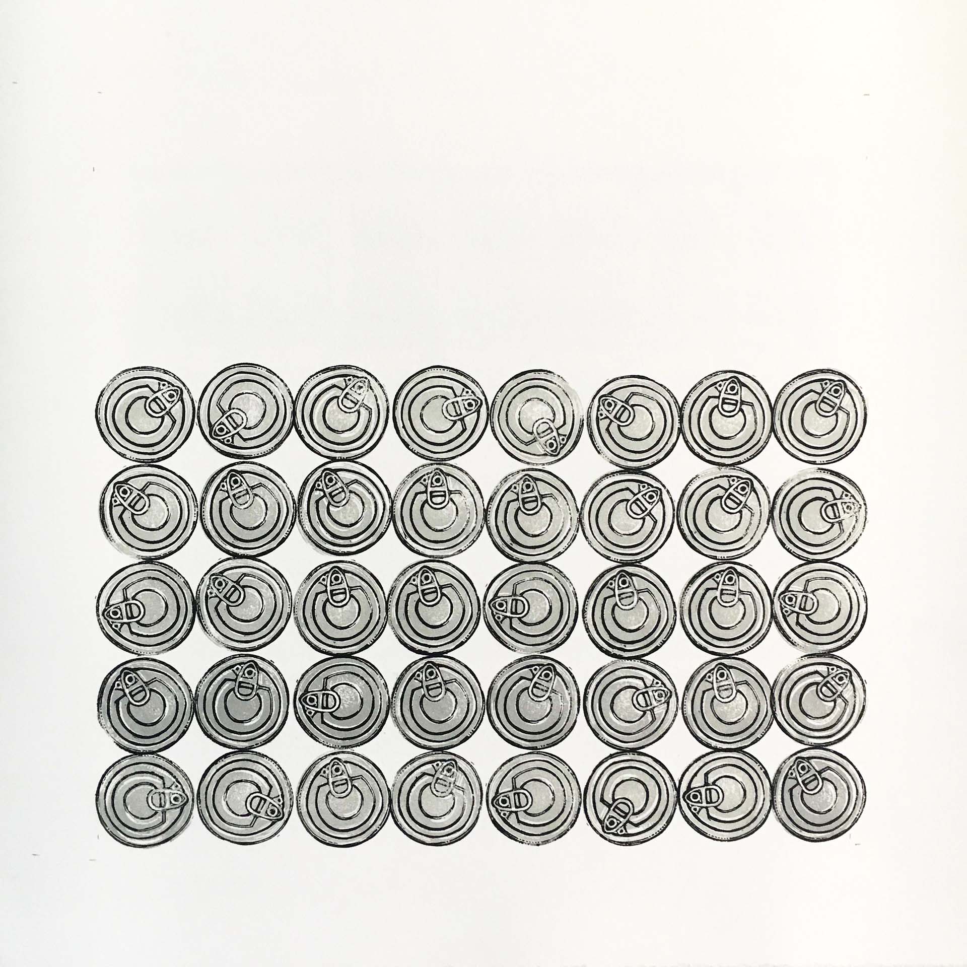 Rows of pull tab food can tops in silver and black