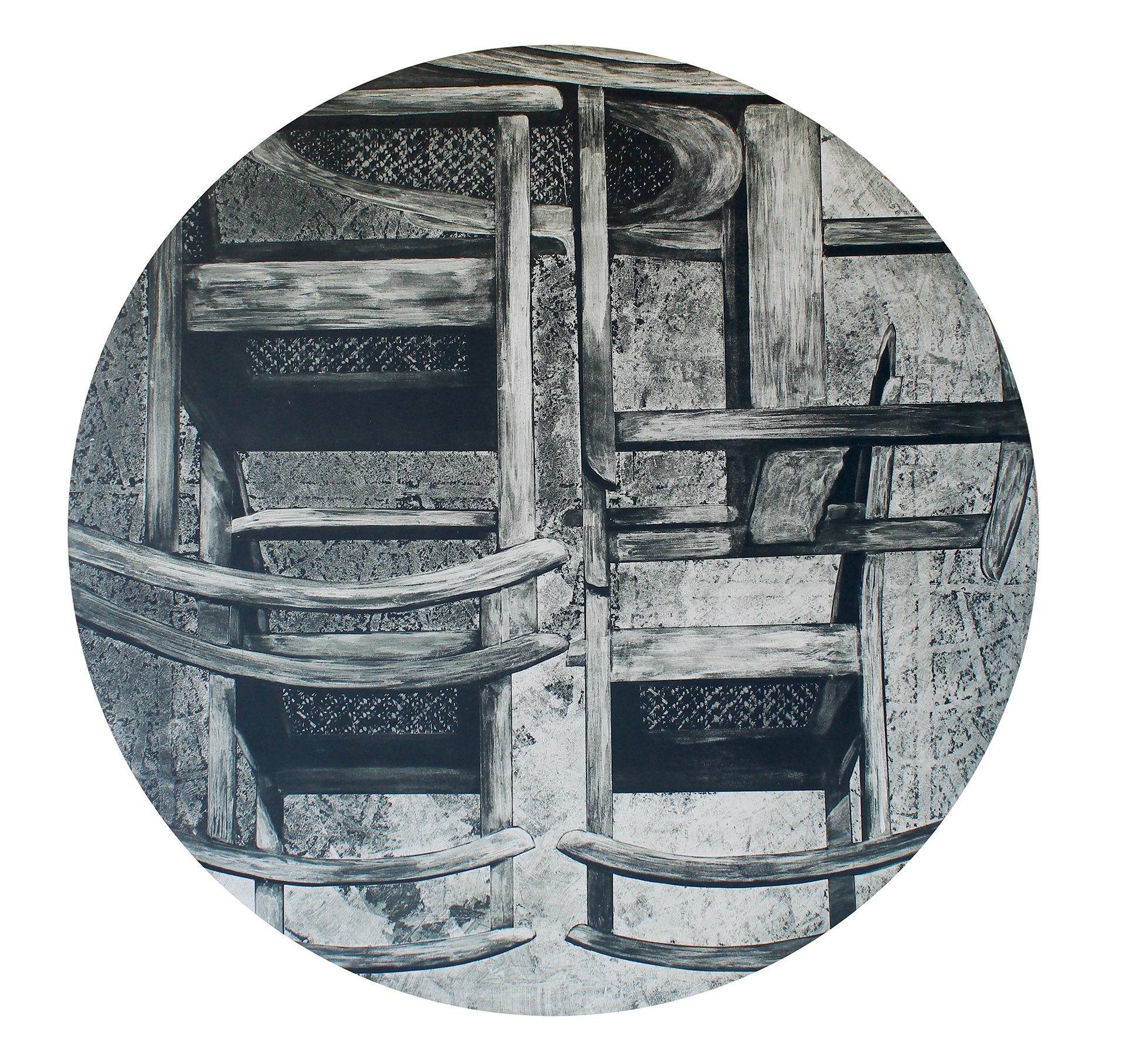de jesus_marcos_6 Stacks of rocking chairs in gray fill a round composition.