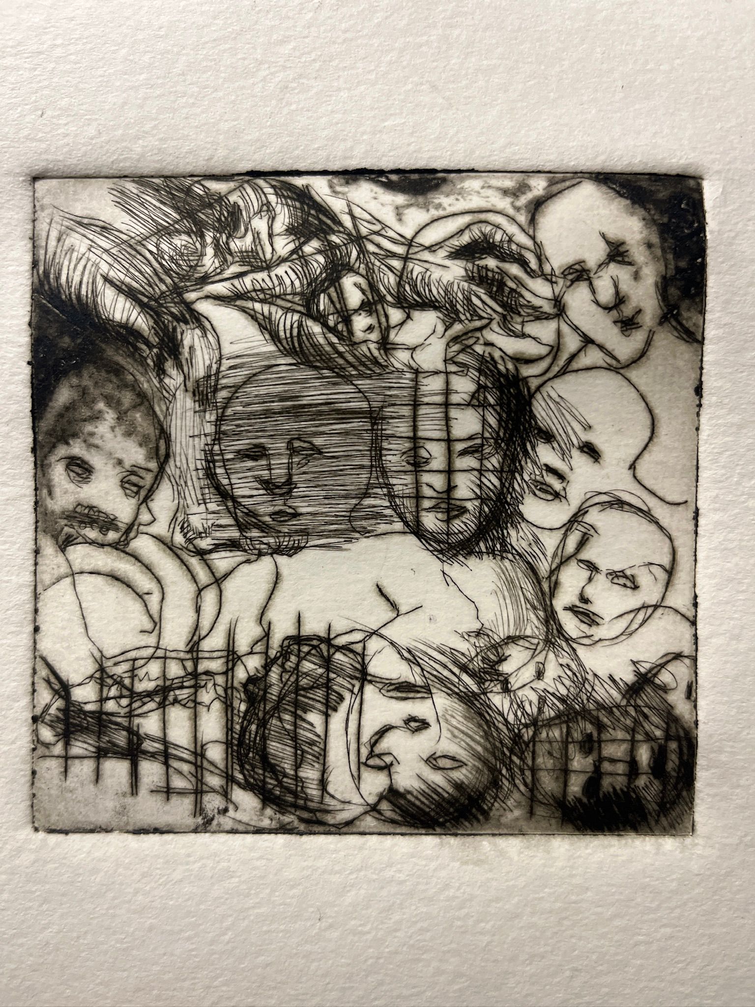 romansoto_sebastian_8 Abstracted heads emerge from a busy drypoint background