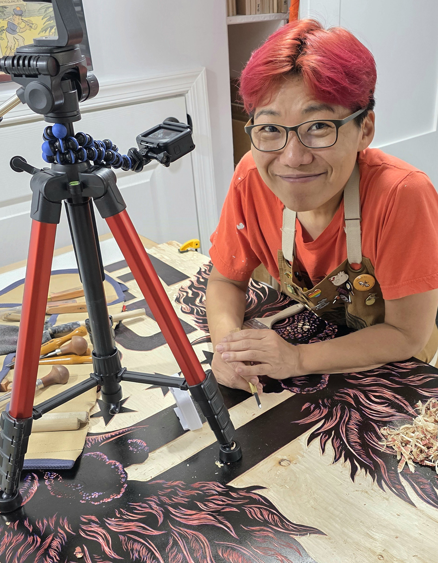 photo of artist, Jennifer Graves in front of her work