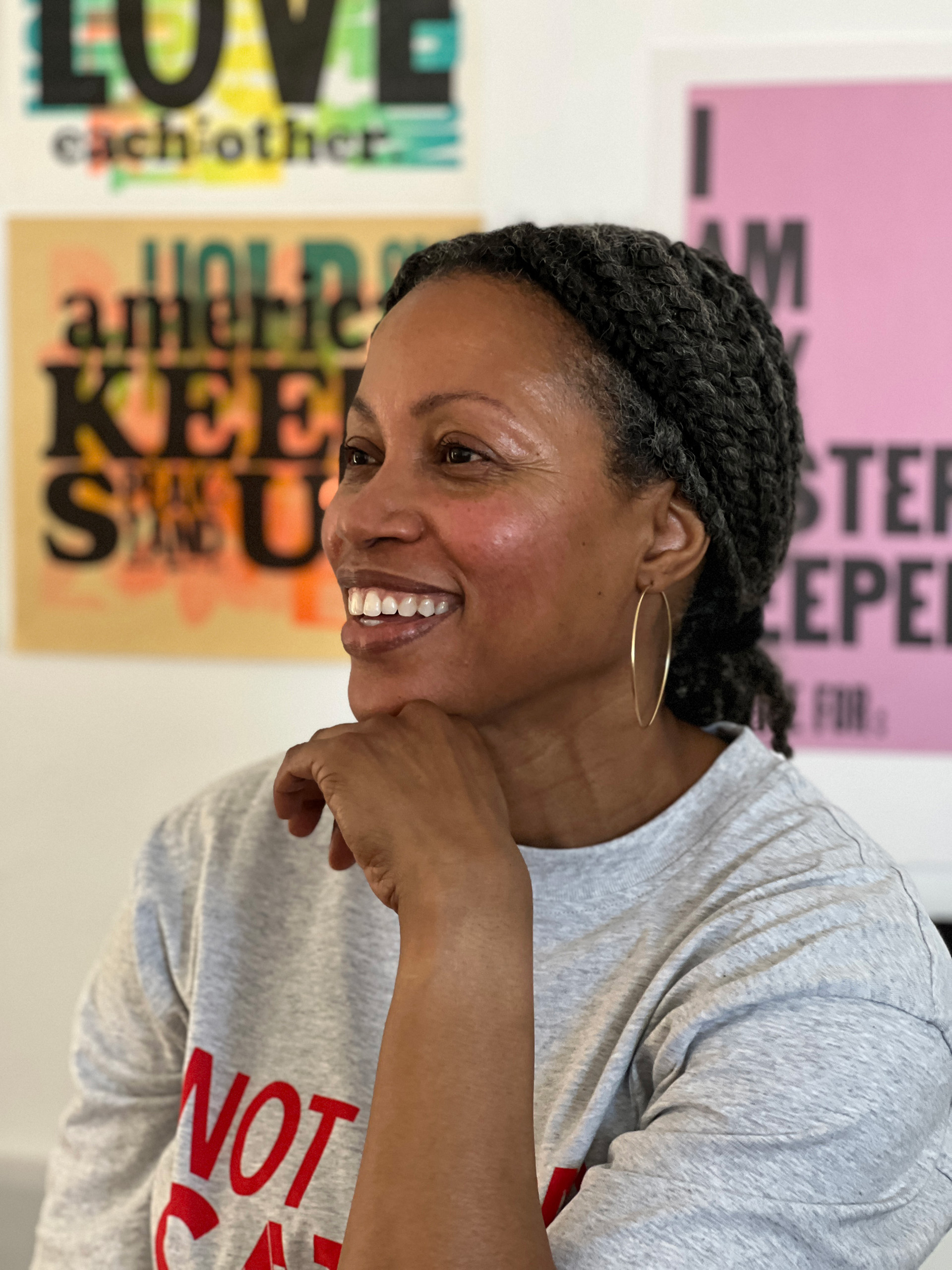 photo of artist, Jennifer Graves in front of her work