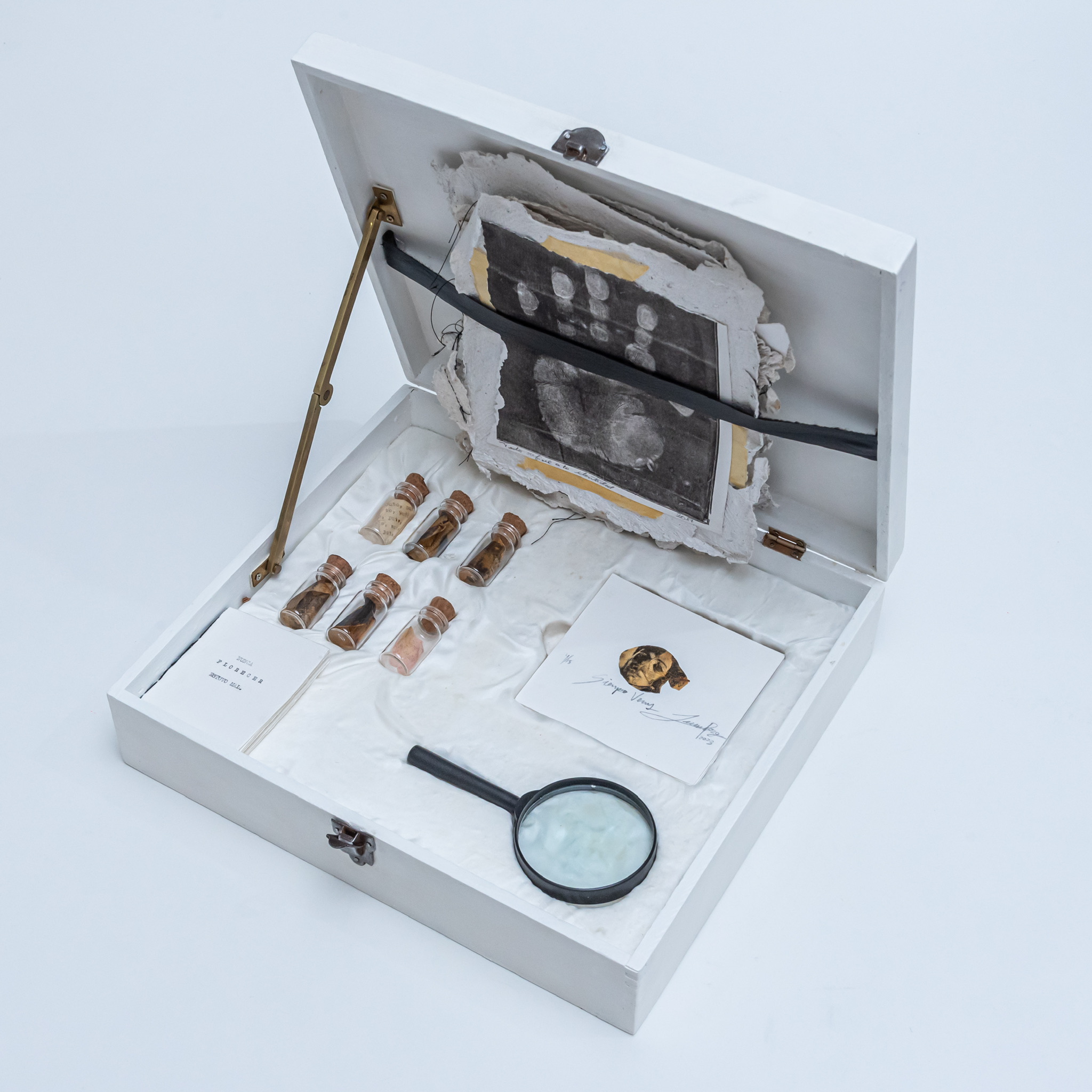 A plotter cut scribble covered with pink and a grid of green scribbles sits on a fluorescent pink background.