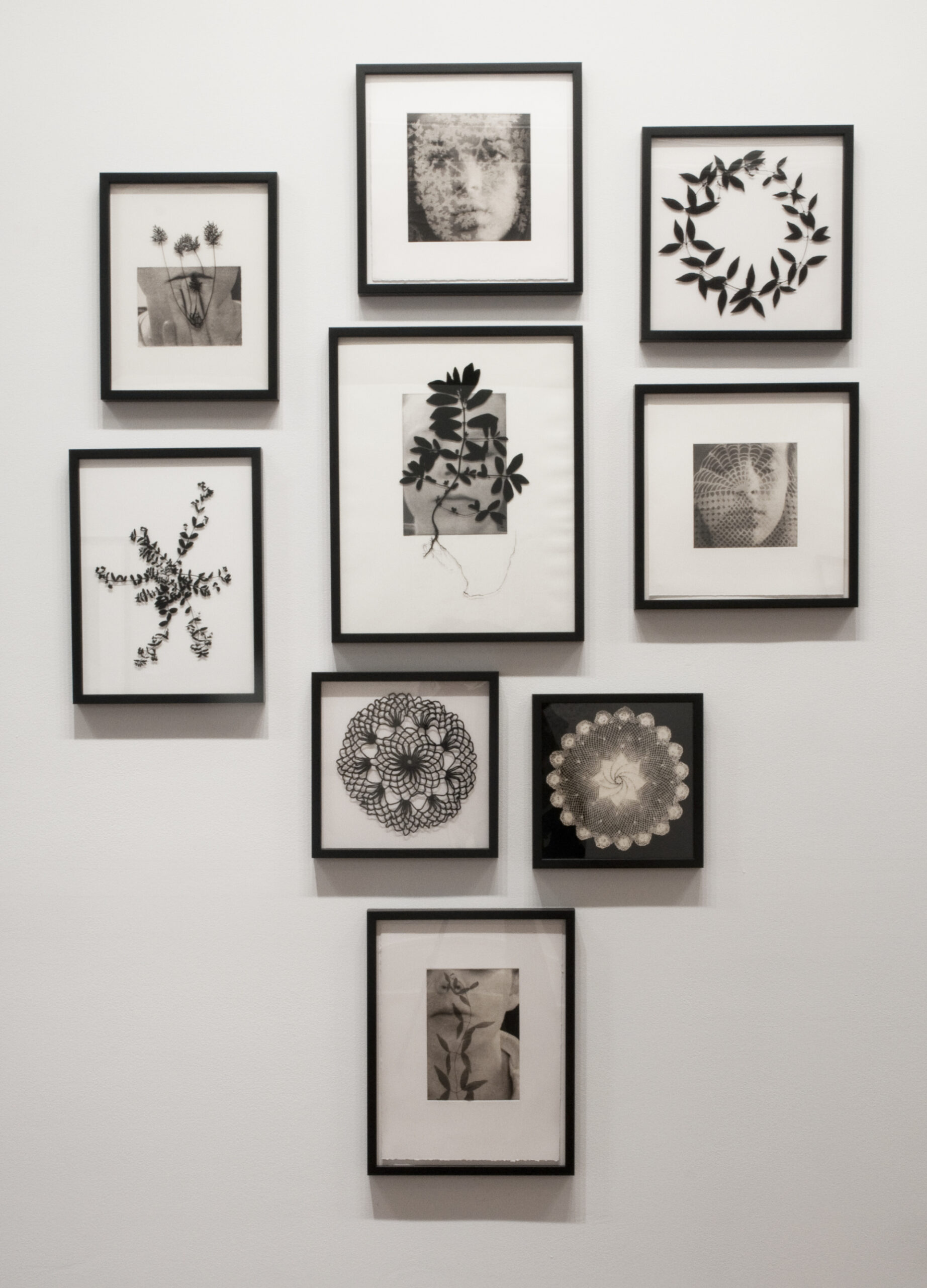 A femme presenting individual with a Bob haircut faces ¾ to the left. They are printed in pink and blue, overlapping to make purple. The two layers are comprised of pink tiny scribbles placed very closely in a grid formation. The person hands are grabbing at their chest and have a far off expression on their face.  A lime green square grid overlaps itself in the background and on top of the person, leaving part of their face and chest exposed. </p>
<p>The print has distorted squares cut out of the paper. There is a bright pink scribble behind the cut out section, and in the upper right corner.<br />
