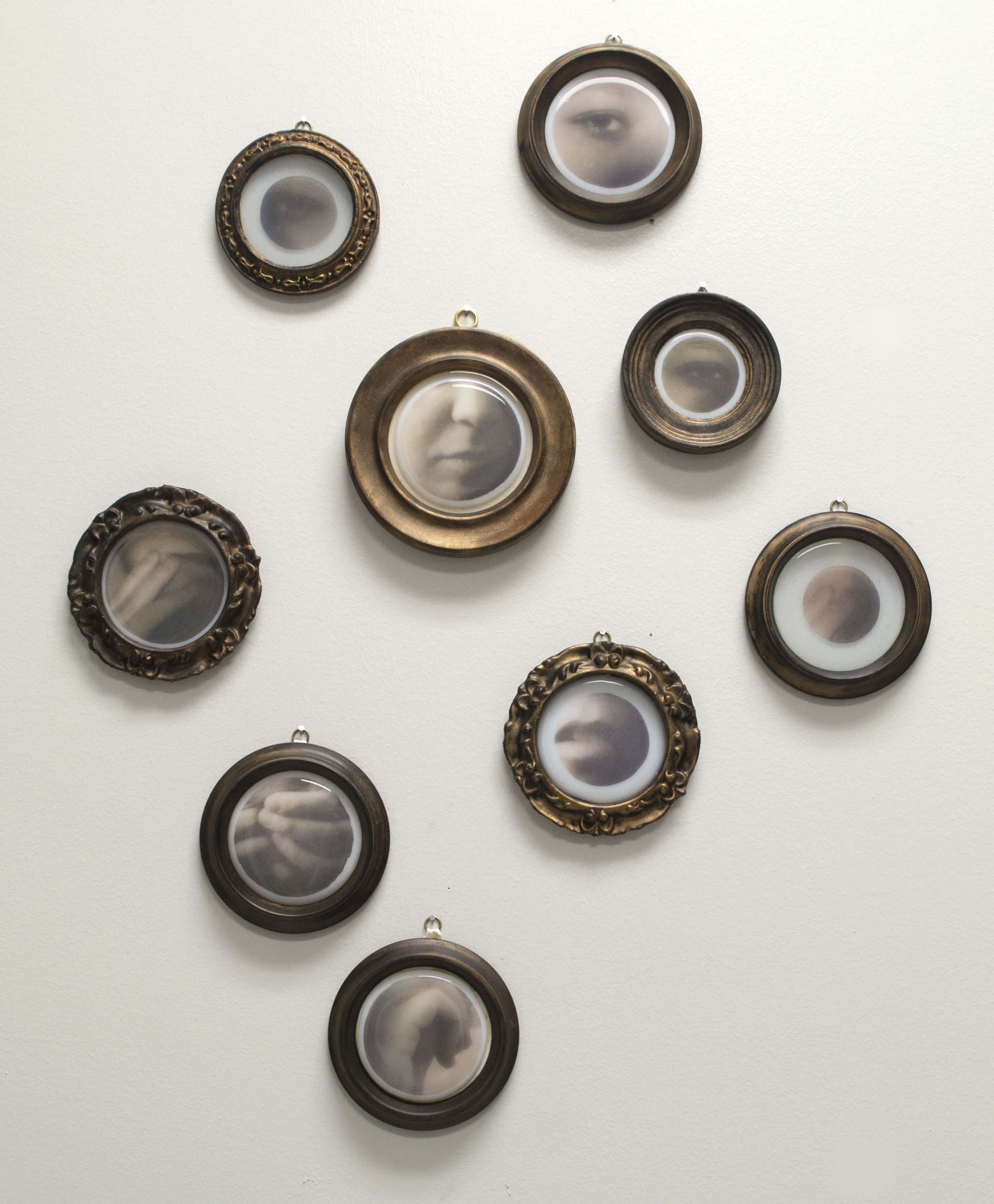 A white plotter cut shape of an abstracted EKG of a panic attack sits upon a grid of green scribbles on a pink ground